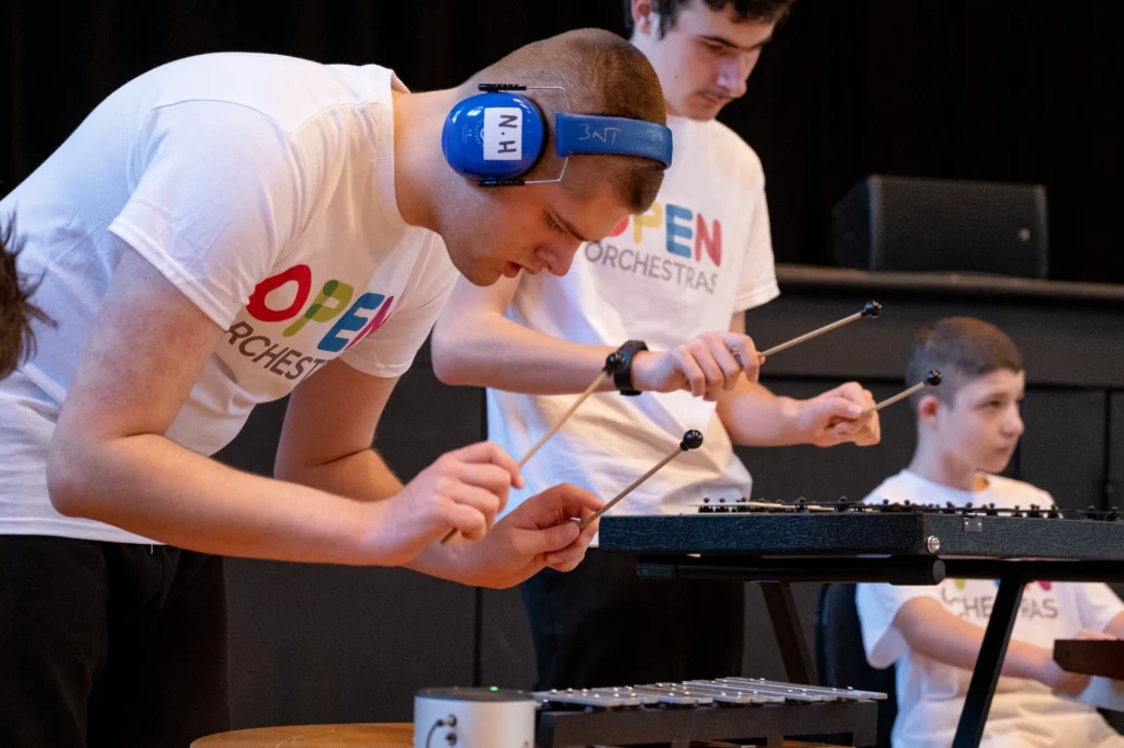 Two young musicians playing the xylophone.